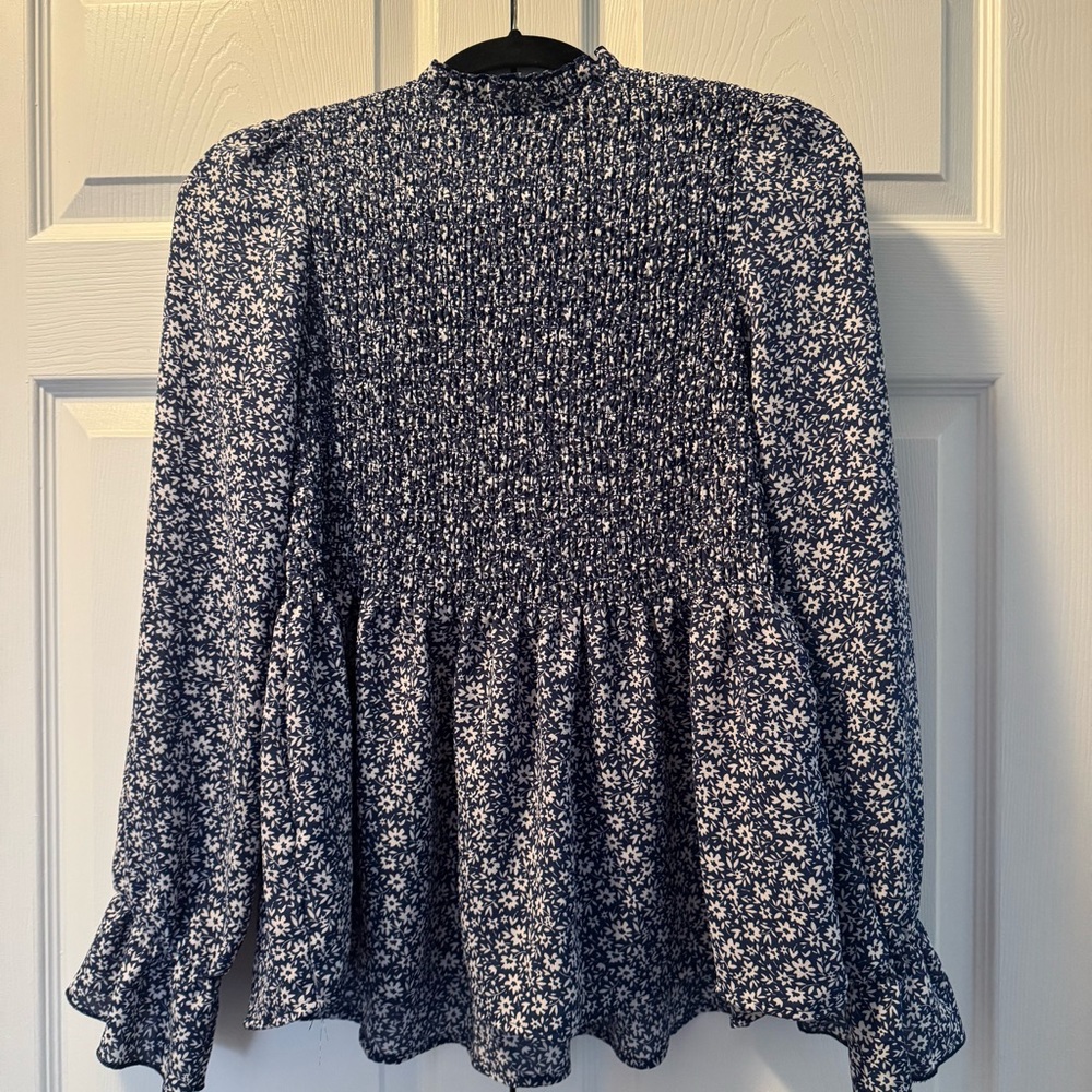 Francesca’s Floral Smocked Blue Top